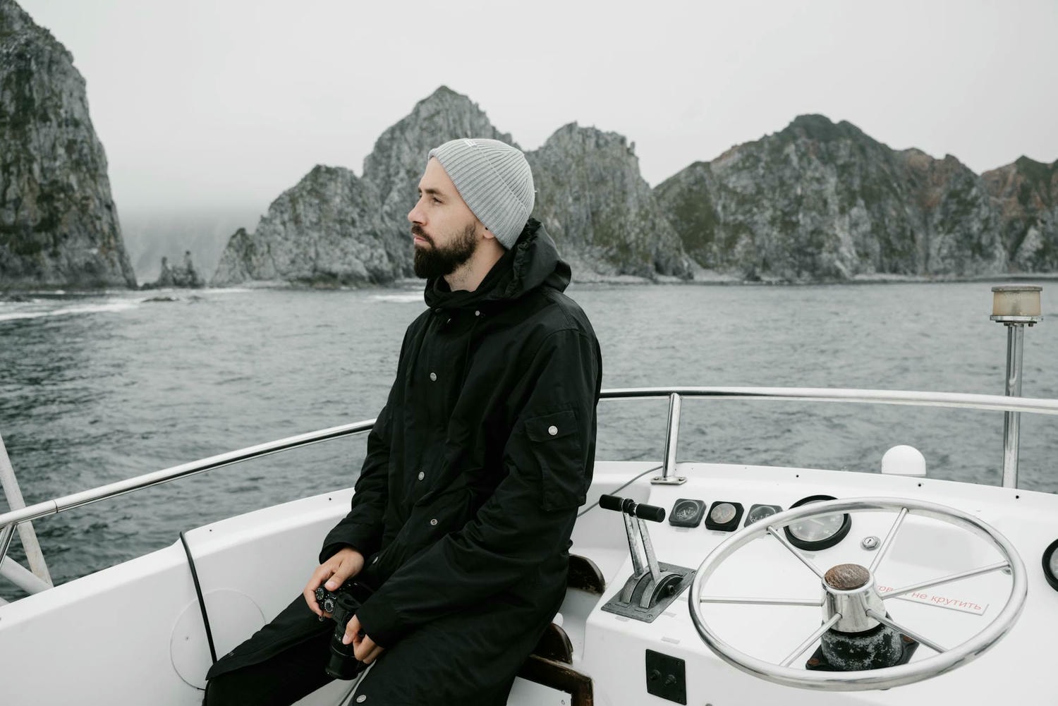 man sitting on boat